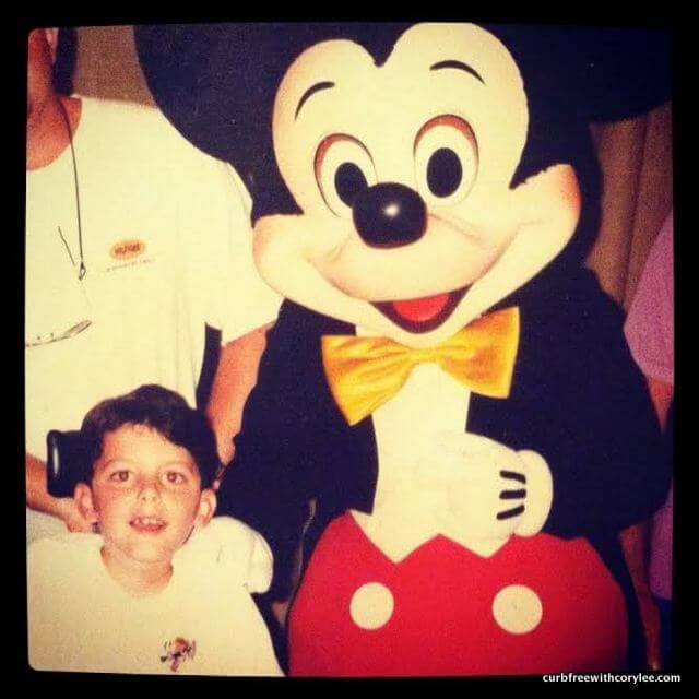 With Mickey Mouse at Disney World.